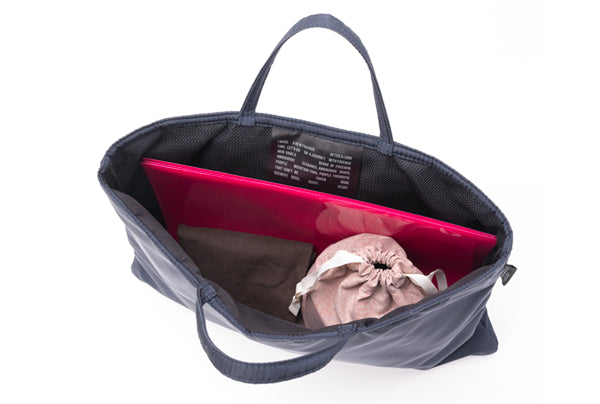 Sized to accommodate A4 files, slippers